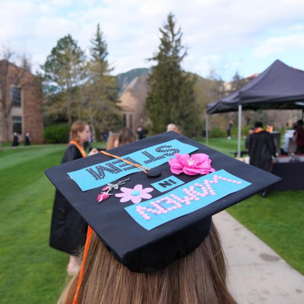 Students and faculty gather on the quad before processing to Folsom Stadium