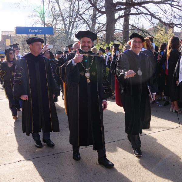 Commencement procession from Norlin Quad to Folsom Stadium