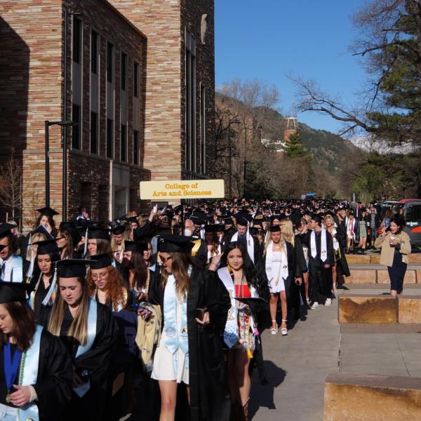 Commencement procession from Norlin Quad to Folsom Stadium