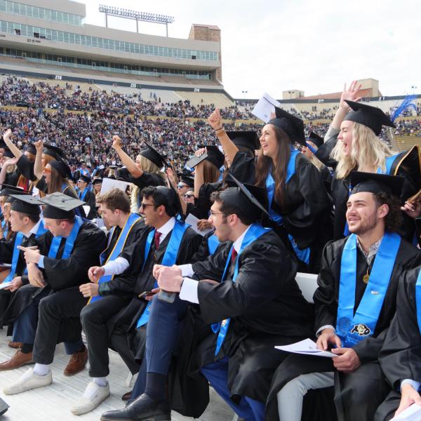 Commencement procession from Norlin Quad to Folsom Stadium