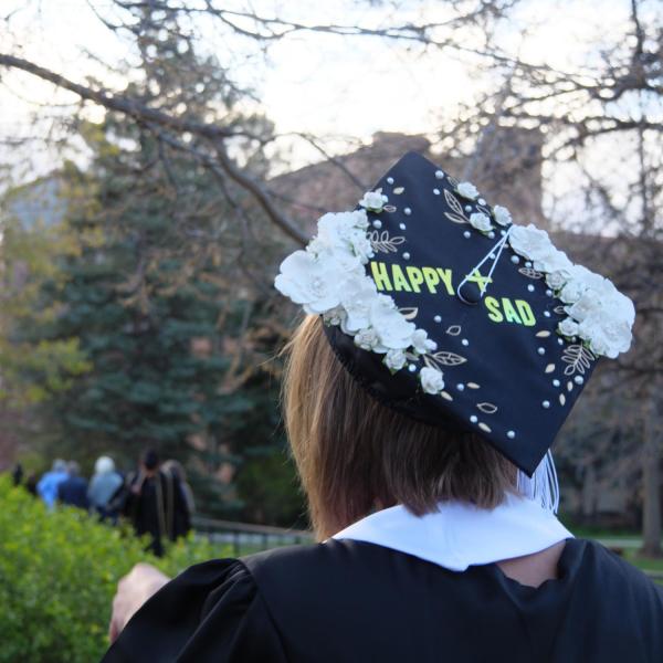 Students and faculty gather on the quad before processing to Folsom Stadium