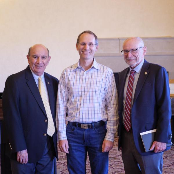 Paul Romatschke with Chancellor Phil DiStefano and Provost Russ Moore
