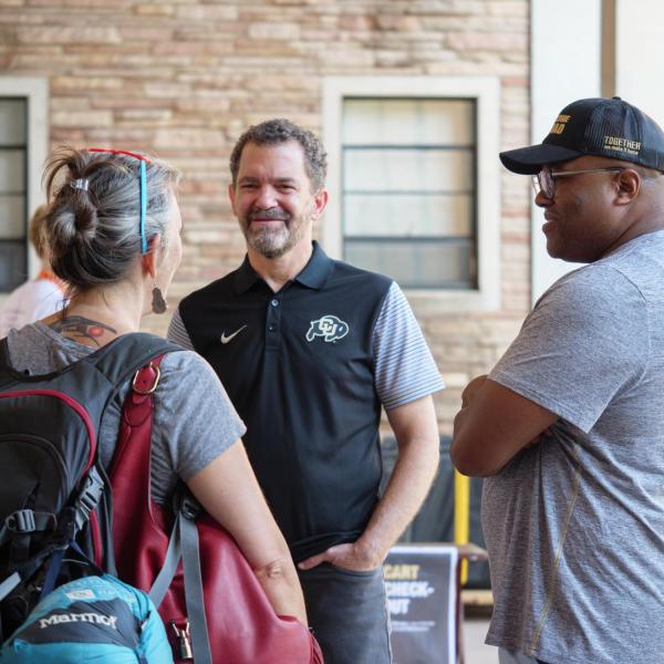 CU system President Todd Saliman greets new students and families during move-in