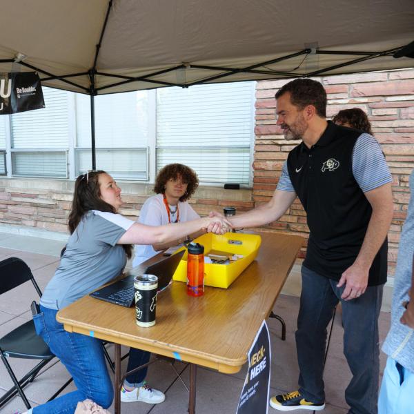 CU system President Todd Saliman greets new students and families during move-in