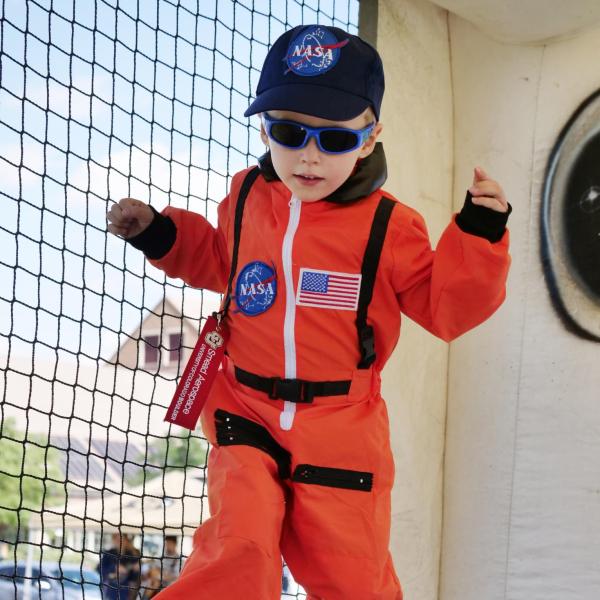 A future astronaut enjoys the bounce house at the ribbon-cutting ceremony for the new Aerospace Engineering Sciences Building at CU Boulder. (Photo by Casey A. Cass/CU Boulder)