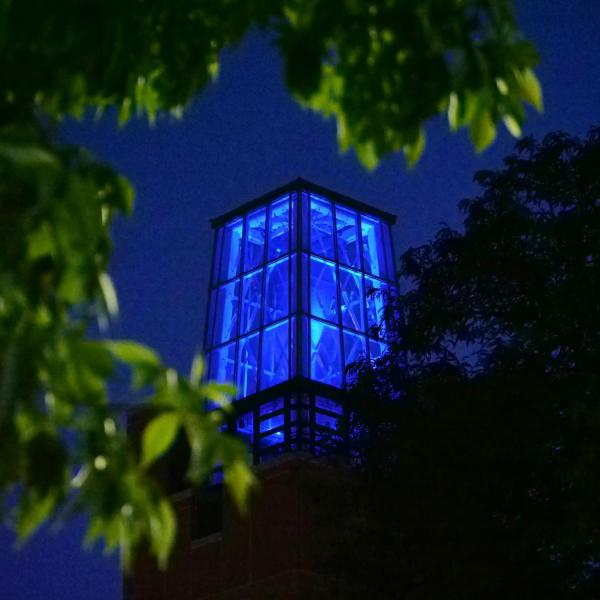 The ATLAS tower shines blue in remembrance (Photo by Casey Cass/University of Colorado)