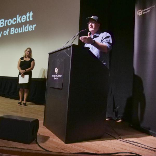 City of Boulder Mayor Aaron Brockett speaks to attendees