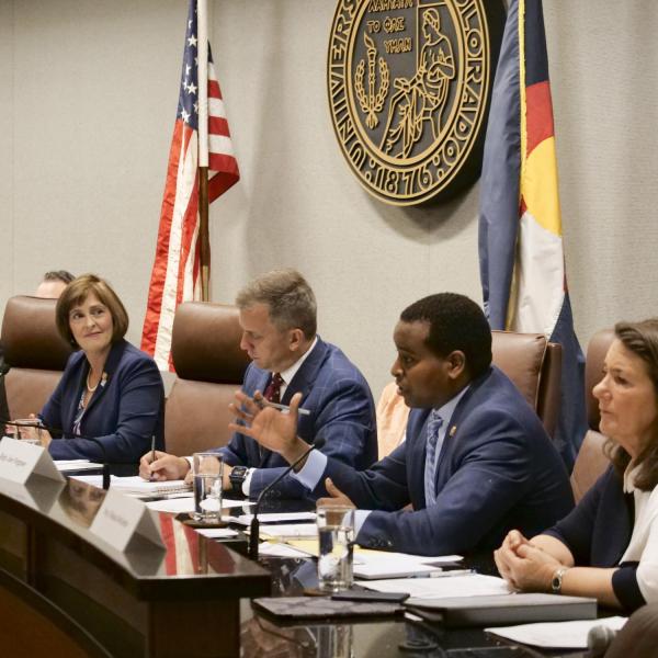 Representative Joe Neguse questions Governor Jared Polis during the House Select Committee on the Climate Crisis hearing at the University of Colorado Boulder. (Photo by Casey A. Cass/University of Colorado)