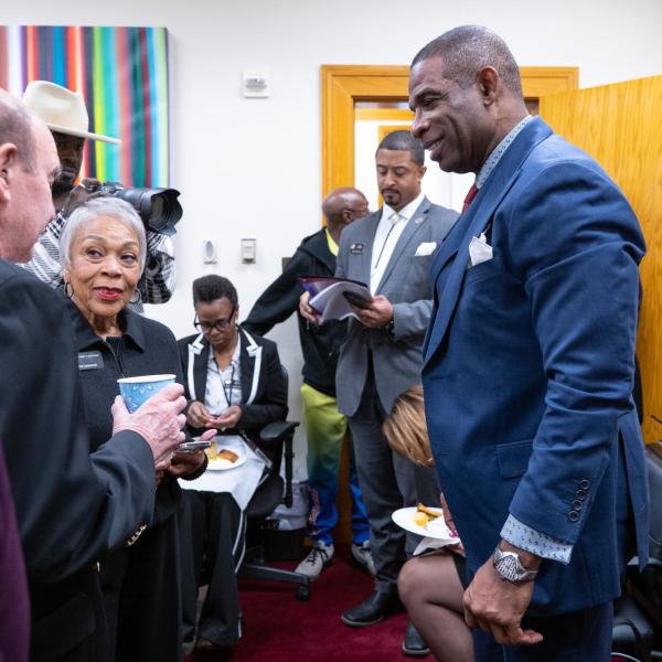 Deion Sanders joins members of the Colorado Black Caucus for breakfast and conversation