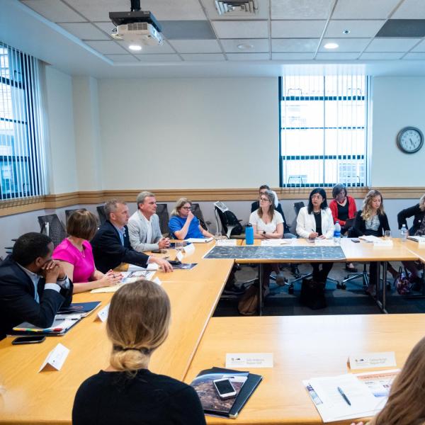 Members of Congress and CIRES fellows discuss current topics on climate change, during a congressional tour of CIRES. (Photo by Patrick Campbell/University of Colorado)