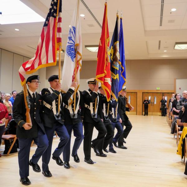 Joint ROTC Color Guard presents the colors at the beginning of the ceremony