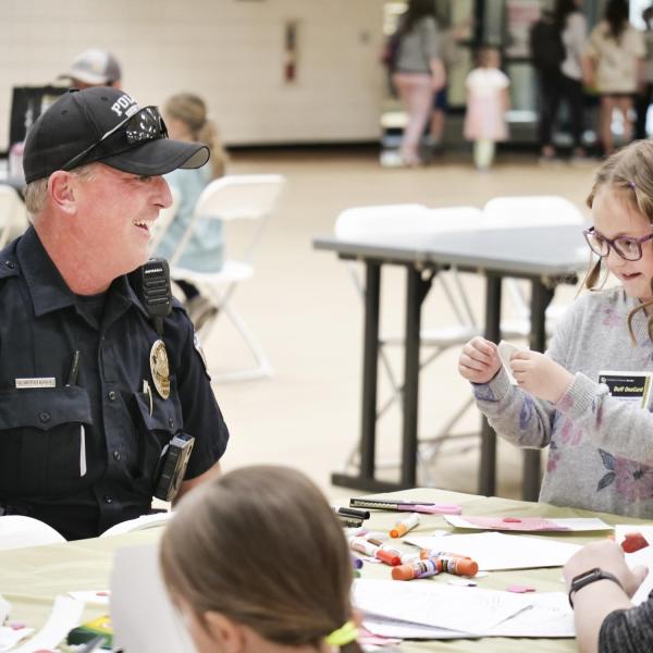 CUPD Officer Jon Allendorf visits with other participants at Campus Kids Day. (Photo by Casey A. Cass/University of Colorado)