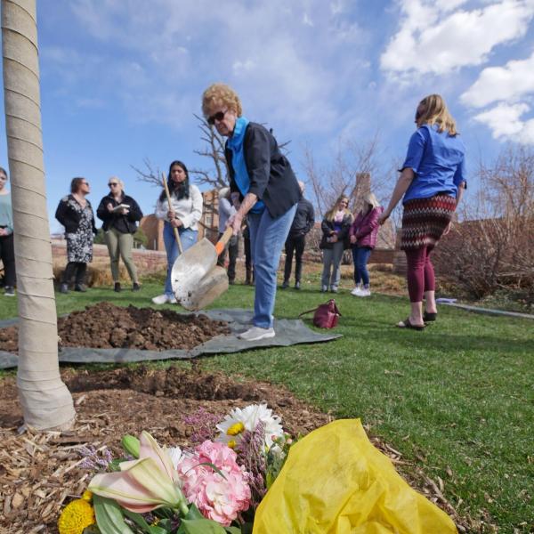 Margie Whittington, the mother of shooting victim Teri Leiker, submits an offering during the dedication ceremony.