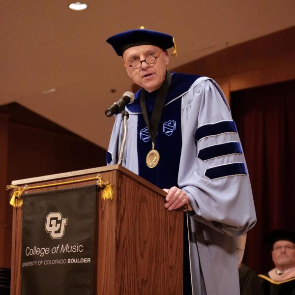 Dean Robert Shay address the graduates during the College of Music ceremony