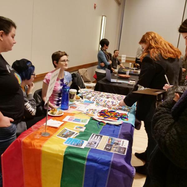 Incoming students check out the Gender and Sexuality Center booth during the spring 2018 New Student Welcome Day.