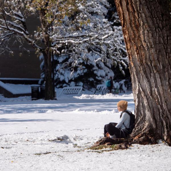 Students enjoy a snowy CU Boulder campus after a snowstorm on Oct. 30, 2019. (Photo by Patrick Campbell/University of Colorado)