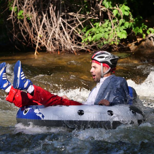 Tubers ride the Boulder Creek during Tube to Work Day 2017