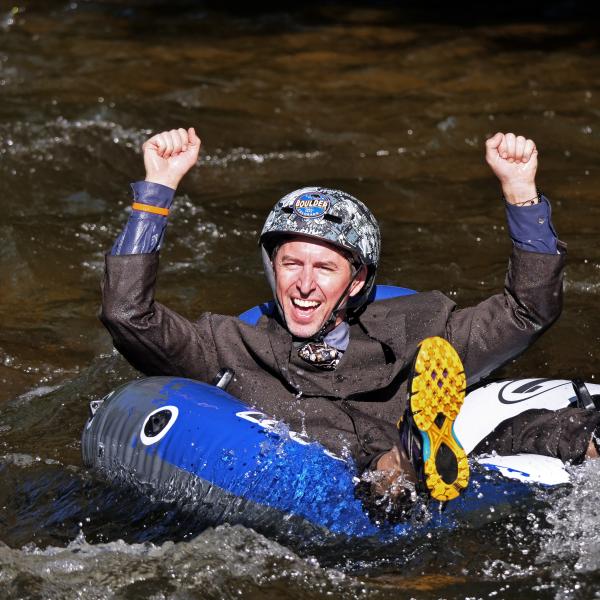 Tubers ride the Boulder Creek during Tube to Work Day 2017