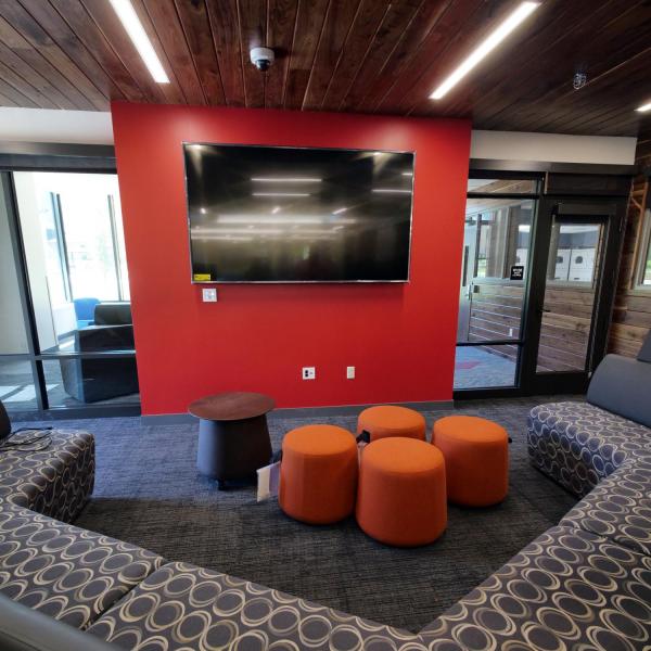 A large flatscreen TV will be hooked up to an eight-player gaming system in the main lobby and gathering space at the new Williams Village East residence hall on the CU Boulder campus. (Photo by Glenn Asakawa/University of Colorado)