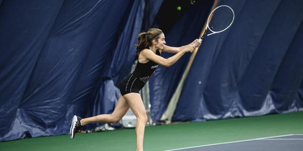 Mila Stanojevic playing tennis