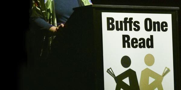 Buffs One Read sign on a podium at the 2022 speaker event