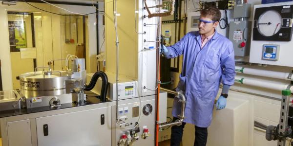 Person working in a university laboratory.