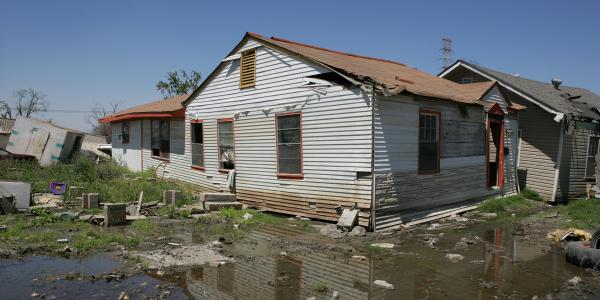 A house in Houston shows visible damage after flooding. 