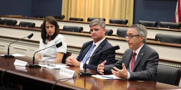 Dean Scott Adler testifying at Congressional hearing