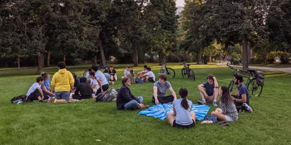 Students gathered in person outside