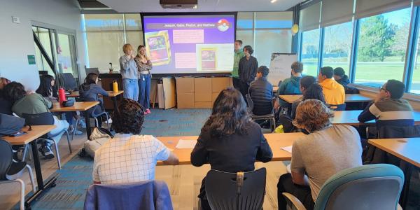 High school students give a presentation in the classroom