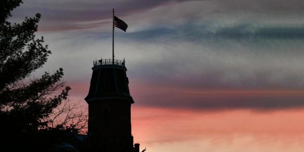 Silhouette of Old Main at sunset