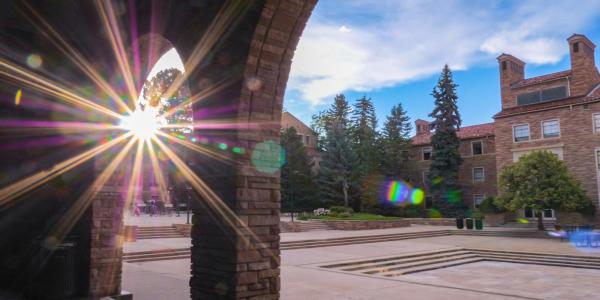 The sun sets behind the UMC loggia.