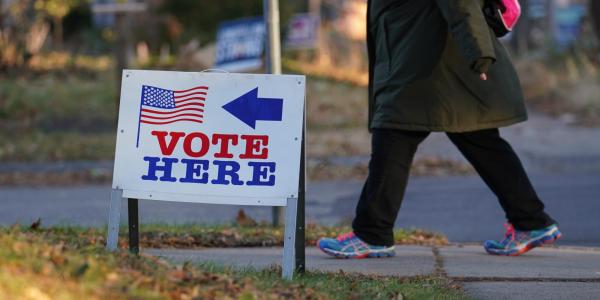 Sign that says 'vote here'