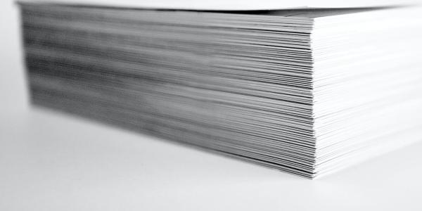 A stack of paper (Photo by ron dyar on Unsplash)