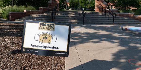 A Protect Our Herd sign at Farrand Field