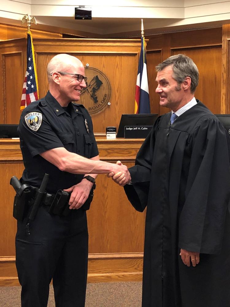 Tom Matlock being sworn in as commander in 2019