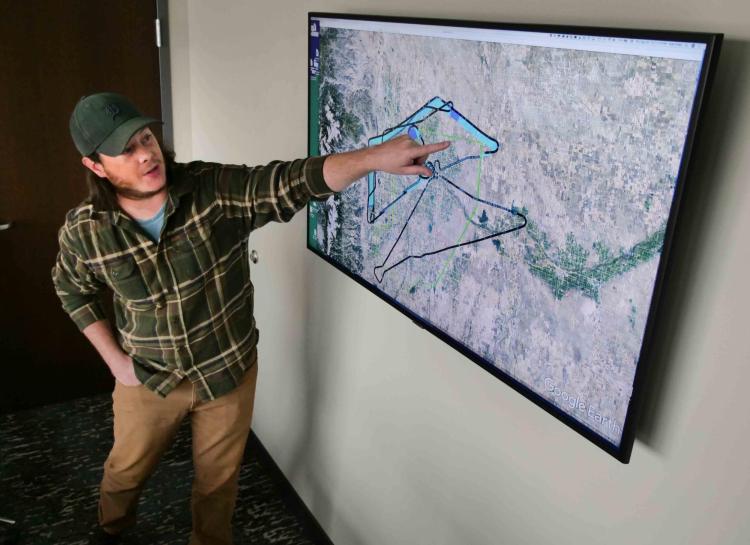 Graduate student explaining a typical flight pattern for the aircraft.