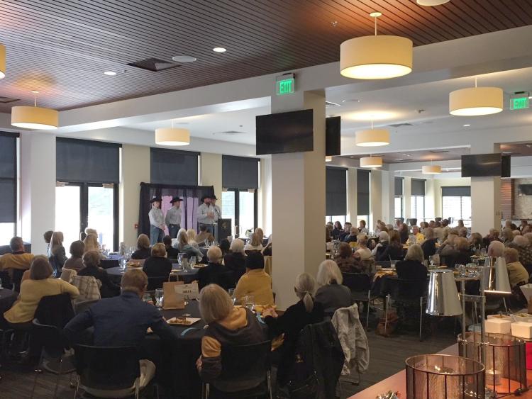 Four Ralphie handlers speak at a Buffalo Belles luncheon