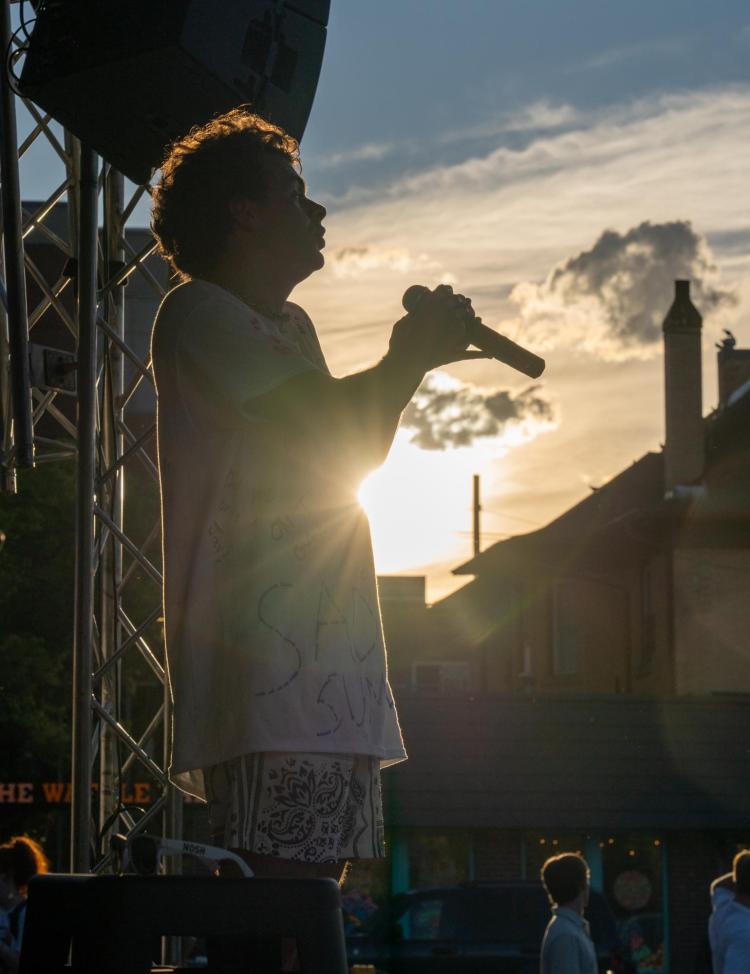 Drew Hersch kicks off BuffStreet on The Hill on Aug. 26, 2021. (Photo by Jacob Houser/University of Colorado)