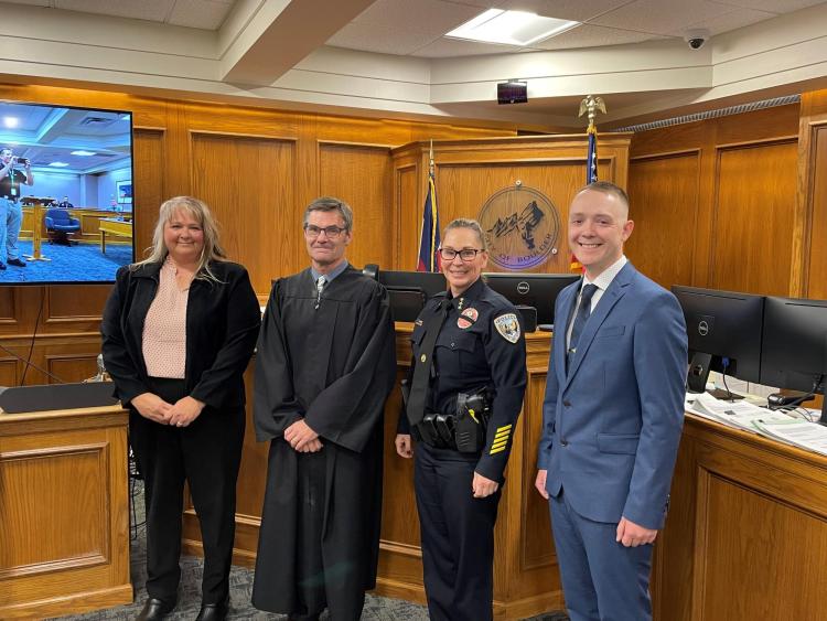 New CUPD officers Cathy Chestnut and Matt Dillon with Chief Jokerst and Boulder Municipal Judge Jeff Cahn
