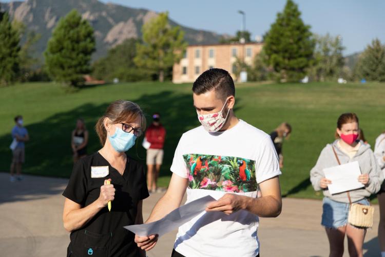 Campus community members wearing masks