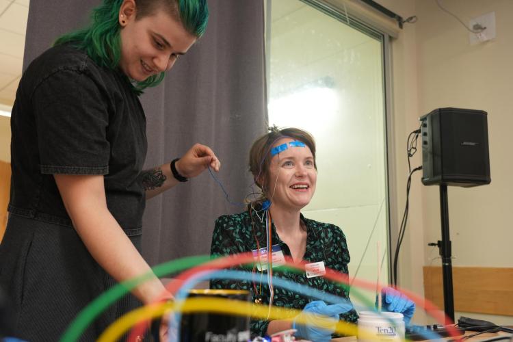 Grace Leslie getting EEG wires taped to her head