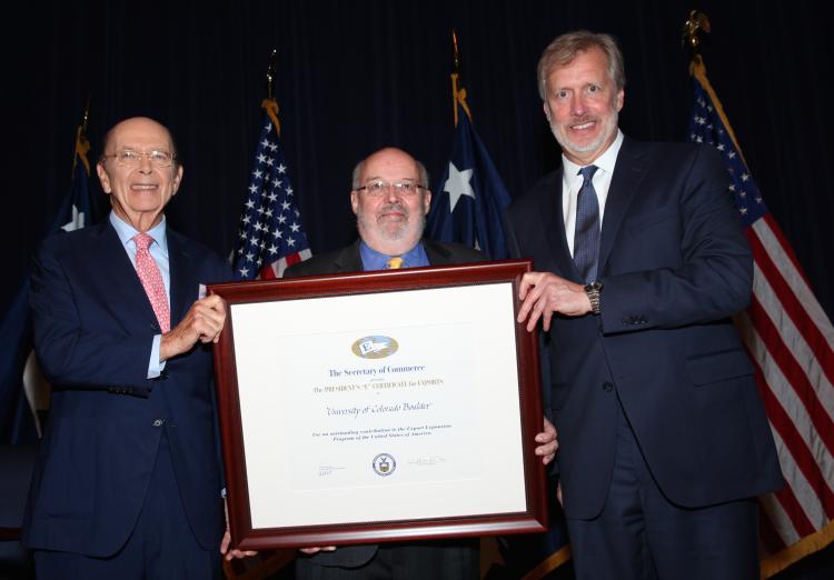 Larry Bell receiving E-AWard in Washington DC