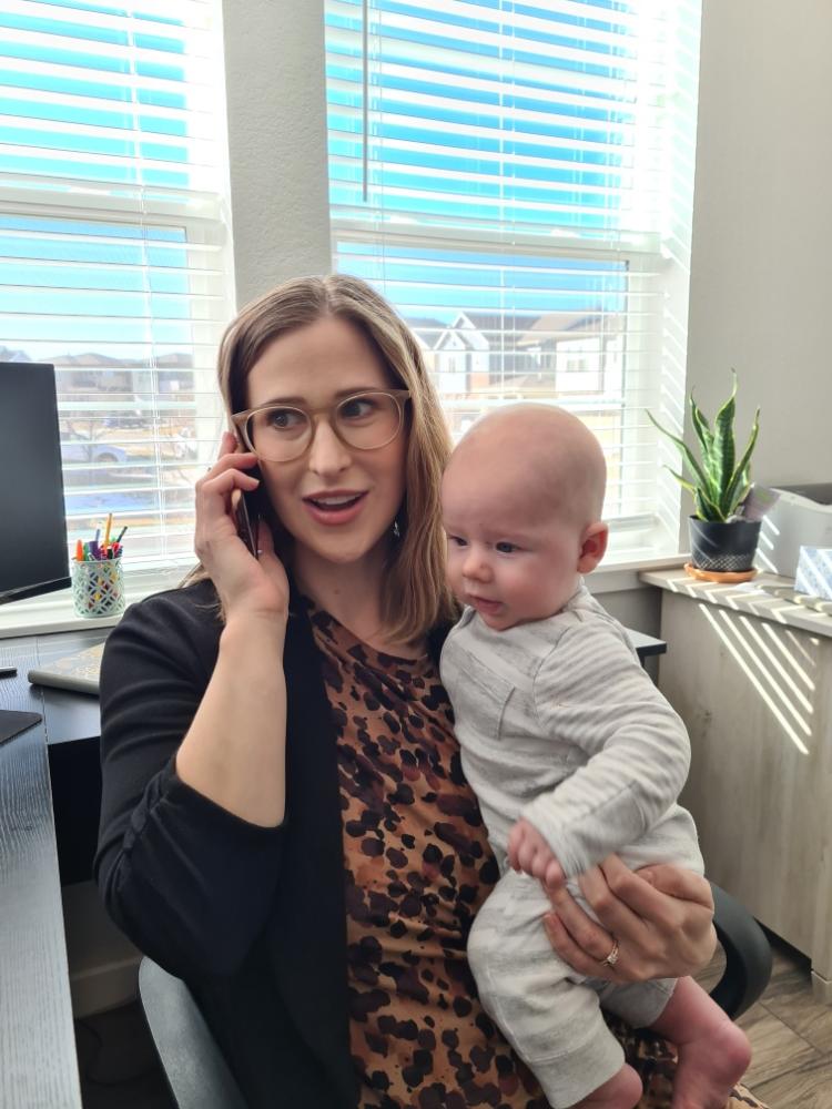 Kate Lanter and her son in her home office