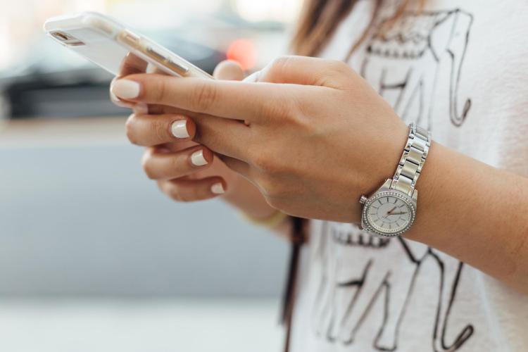 Young person checking cellphone