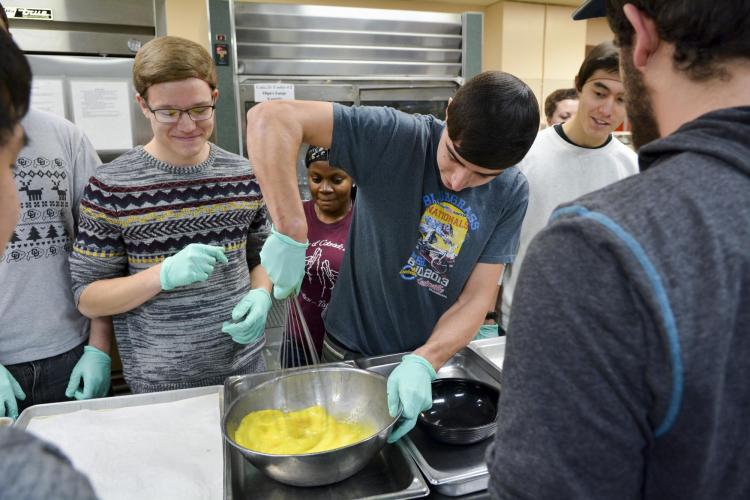 Students improve their cooking skills at Ralphie's Cooking Basics