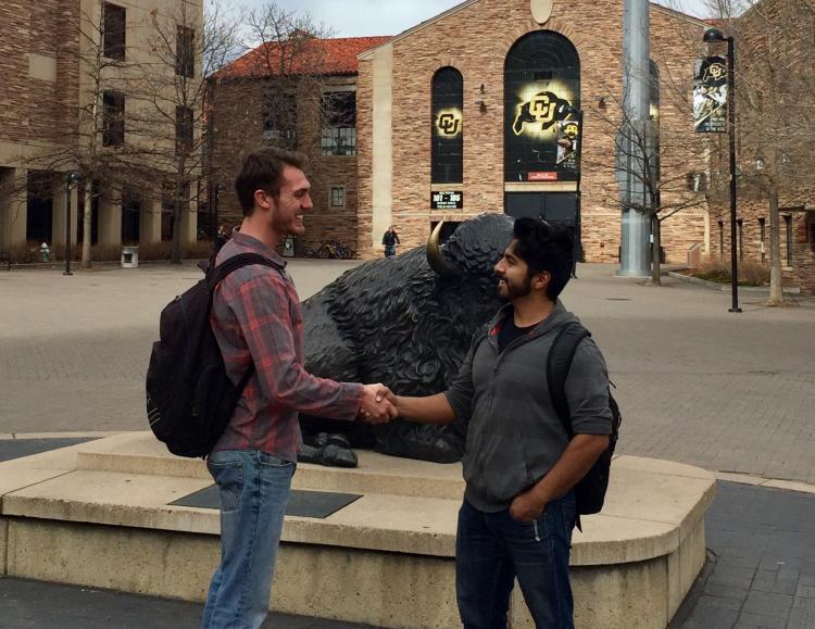 Student veterans shaking hands