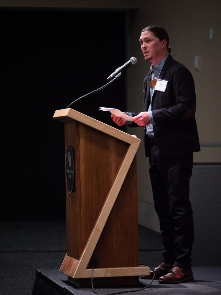 Clint Carroll, associate professor of ethnic studies at CU Boulder, speaks to the crowd during The Chancellor’s Annual Summit. 