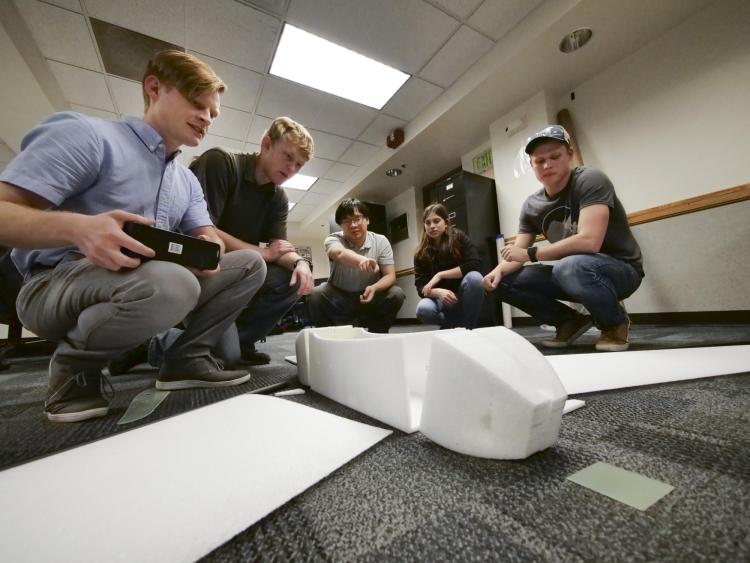 Aerospace engineering students with SHAMU whale-scouting drone