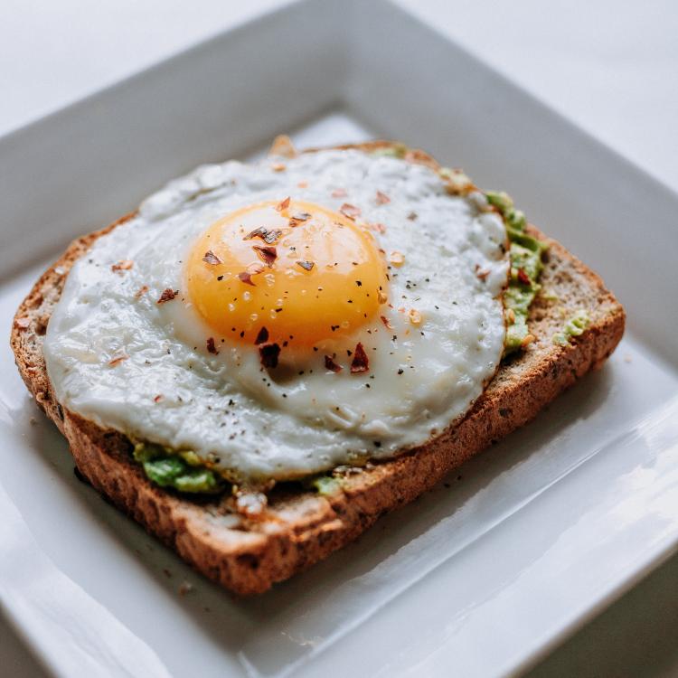 avocado toast with a fried egg on top